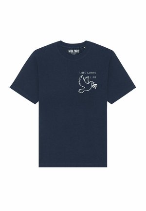 T-shirt en coton marine avec des manches courtes, un col rond et un graphisme blanc représentant une colombe avec une branche d'olivier et le texte "LIBRE COMME L'AIR."