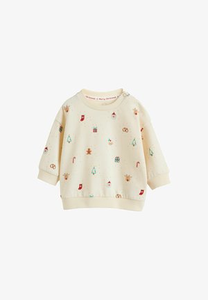 Cremefarvet sweater med lange ærmer, der har festlige mønstre som træer, gaver og snemænd, suppleret med røde og grønne detaljer.