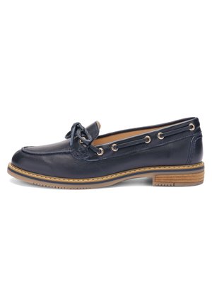 Navy blue leather loafer with moc toe stitching, lace bow on vamp, side eyelets with leather lace, and tan rubber sole with slight heel.