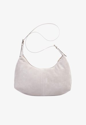 Torba na ramię zamszowa w kolorze wielbłądzim, o zaokrąglonym kształcie, z regulowanym paskiem i minimalistycznym designem. Gładka faktura z subtelnymi detalami przeszyć.