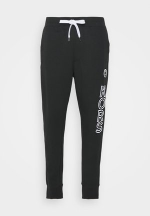 GO RUNNING JOGGER - Tracksuit bottoms - black