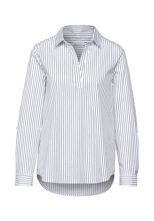 Chemise blanche à manches longues avec des rayures verticales noires, col chemise et ourlet légèrement courbé. Dotée d'une patte de boutonnage partielle.