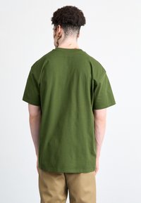 Carhartt WIP AMERICAN SCRIPT - T-Shirt basic - tarragon