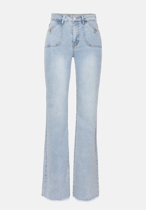 Heledad sinine denimist kostüümipüksid kõrge vöökoht, ees taskud ja toores hem. Kangas on kahvatu pesu ja kerge tekstuuriga, sisaldades minimaalset riistvara.