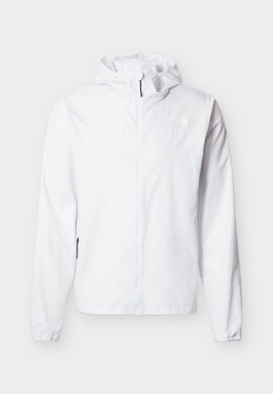 Valge kapuutsiga kerge jope, millel on täielikult esilukuga ning lukuga küljetaskud, rinnal brändilogo ja elastsed varrukasuu.