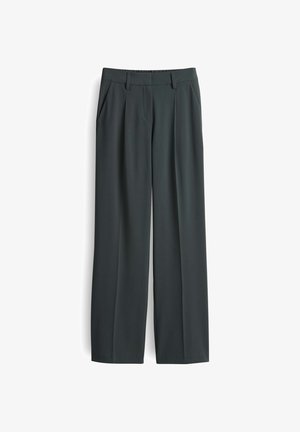 Pantalons larges gris foncé en tissu lisse, dotés de poches avant et d'une taille ajustée avec passants de ceinture.