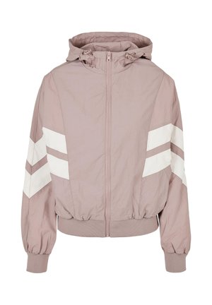 Veste à capuche mauve clair avec fermeture éclair intégrale à l'avant, poignets et ourlet élastiques, et bandes blanches en forme de chevrons sur les deux manches.
