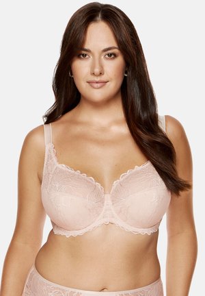 Koronkowy biustonosz w delikatnym różu z falbaniastymi krawędziami, z wsparciem w postaci fiszbin i regulowanymi ramiączkami. Kwiatowy wzór koronkowy z gładkim wykończeniem.