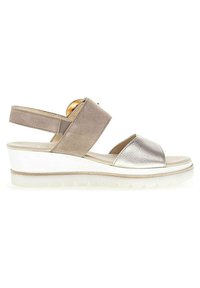 Wedge sandal featuring a grey suede upper and silver leather accents. Elastic ankle strap, white platform sole with textured grip.