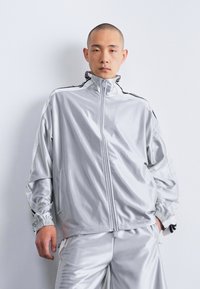 adidas Originals MEGABREAK - Pantaloni sportivi - grey