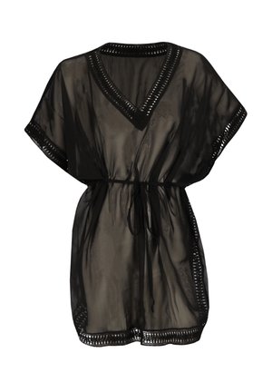 Tunique noire ample et transparente avec manches courtes, col en V, taille nouée et bordure décorative ajourée le long des bords.