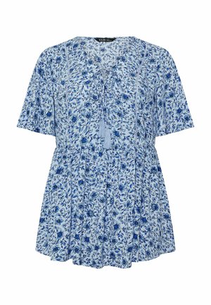 Vaaleansininen kukkakuvioinen paita, jossa on lyhyet hihat, kerrostettu vyötärö ja edessä solmittava nyöri, jossa on tupsuja. Kuosina tummansiniset ja keskisiniset kukat.