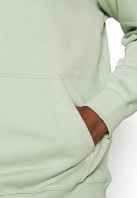 Weekday STANDARD HOODIE - Sweatshirt com capuz - sage green