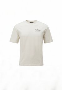 Κρεμ κοντομάνικο t-shirt με μικρό μαύρο κείμενο "CLSR LDN" και γκρι κείμενο "ATELIER" στην αριστερή πλευρά του στήθους.