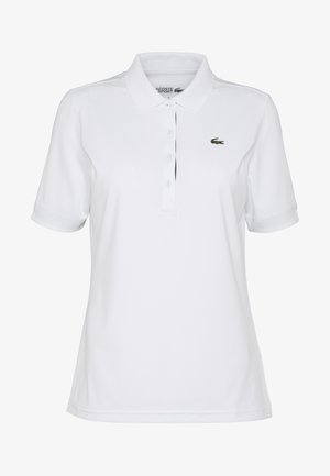 Weißes Polo-Shirt aus glattem Stoff, mit einem Drei-Knopf-Verschluss, kurzen Ärmeln und einem kleinen grünen Krokodil-Logo auf der Brust.