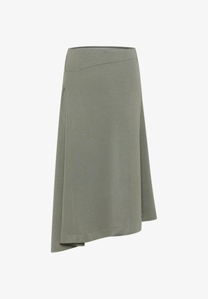 Jupe asymétrique vert olive clair, en tissu doux. Elle présente une ceinture lisse et un ourlet drapé pour un look fluide.