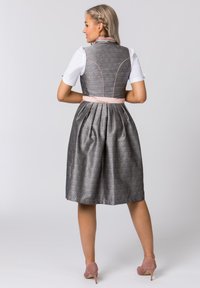 Gray dress with a fitted bodice, pleated skirt, and pink accents. Features a patterned fabric and short white sleeves.