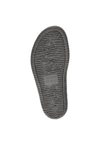 Semelle de chaussure en caoutchouc noir avec une surface texturée et striée, comportant un logo de marque et une empreinte de taille 41. Forme plate et arrondie.