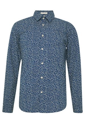 Chemise à manches longues boutonnée, base bleue avec motif floral circulaire blanc, col classique et boutons blancs à l'avant.
