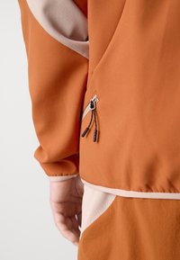 Oakley LATITUDE HOODIE - Jakna iz flisa - ginger
