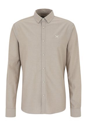 Beiges Langarmhemd mit Knopfleiste, Knopfkragen und kleinem Logo mit gekreuzten Golfschlägern auf der Brust.