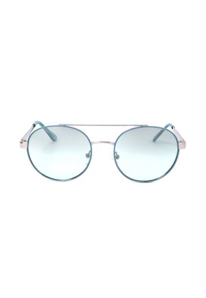Occhiali da sole con lenti tonde leggermente azzurre, montatura sottile in metallo argento e aste blu su sfondo bianco.