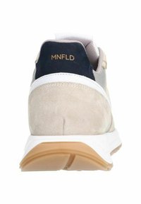 Sneaker with a gray and beige suede upper, navy heel, white accents, and a lightweight tan sole. Features a "MNFLD" label on the back.