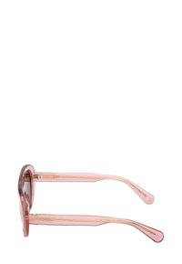 Vaaleanpunaiset läpinäkyvät aurinkolasit, joissa on pyöreät linssit, kullanväriset yksityiskohdat ja hoikat, hieman kaarevat templejouset.