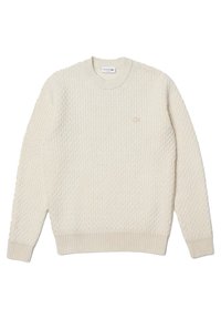 Sweter w kolorze kremowym, dziergany, z teksturowanym wzorem, ściągaczami przy mankietach i dolnym brzegu oraz małym logo na piersi.