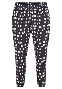 Pantaloni neri a sigaretta con motivo a pennellate bianche, cintura elastica con cordino, tessuto morbido e tasche laterali.
