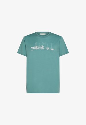 Teal short-sleeved t-shirt made of cotton with a white mountain graphic and text at chest height, featuring a crew neck and standard fit.