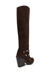 Brown suede knee-high boot with a rounded toe, angled heel, and buckle accent on strap. Textured finish and smooth interior.
