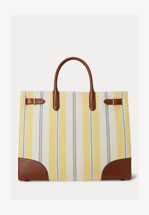 Kandekott vertikaalsete kollaste, valgete ja helesiniste triipudega, pruuni nahast käepidemete, nurkade aktsentide ning kuldsete pandla detailidega valgel taustal.