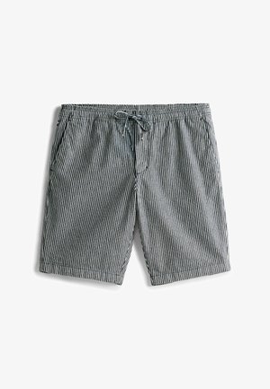 Gestreepte zwembroek met een zwart-wit verticaal streeppatroon, elastische tailleband met trekkoord en zijzakken.