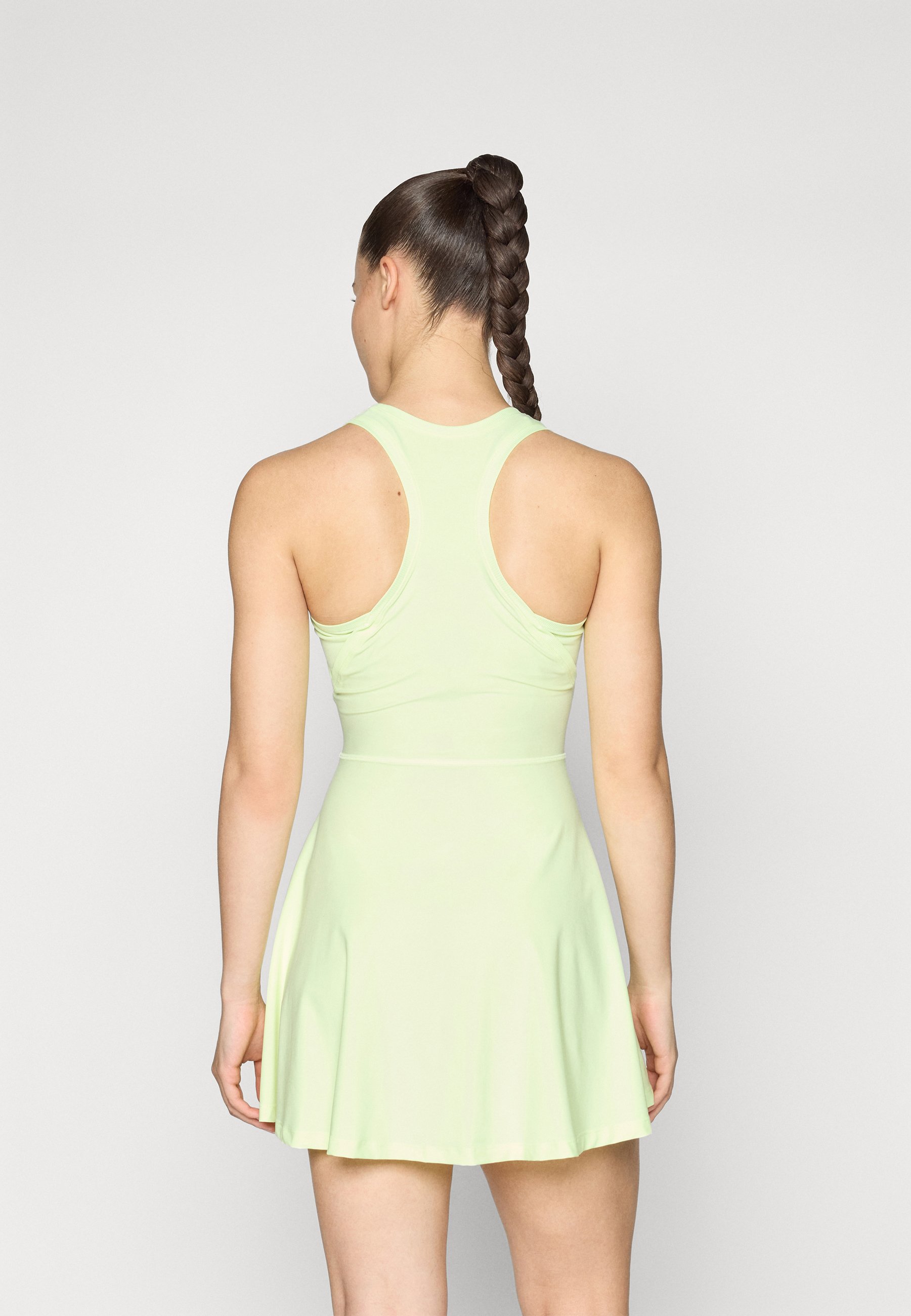 white and gold nike dress