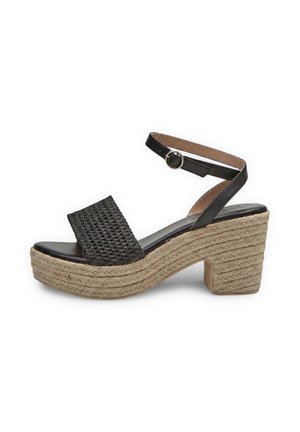 Sandalo aperto nero con cinturino intrecciato sulla parte anteriore, cinturino alla caviglia con fibbia e zeppa a blocco in juta intrecciata.