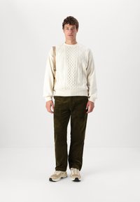 Carhartt WIP TRIDON mleczny