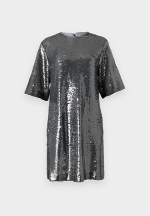 Lyhythihainen mekko, jossa kiiltävät hopeiset paljetit. Pyöreä pääntie ja takana vetoketju. Löysä, suora istuvuus ja sileä pinta.