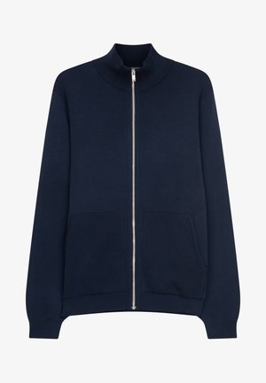 Marine zip-up sweatshirt met hoge kraag, geribbelde textuur, voorzakken en metalen ritsluiting. Zachte stof met een relaxte pasvorm.