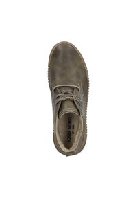 Chaussure en cuir vert clair avec lacets, bout arrondi, accents cousus et semelle en caoutchouc texturée. L'intérieur est doté d'un revêtement doux pour le confort.