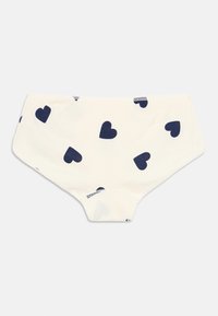 Kokvilnas hipster biksītes krēmkrāsā ar tumši ziliem sirsniņu rakstiem. Iezīmē elastīgu jostu un mīkstu tekstūru. Mazgājamas veļas mašīnā un ērti piegulstošas.