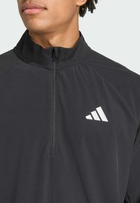 adidas Performance Veste coupe-vent - black