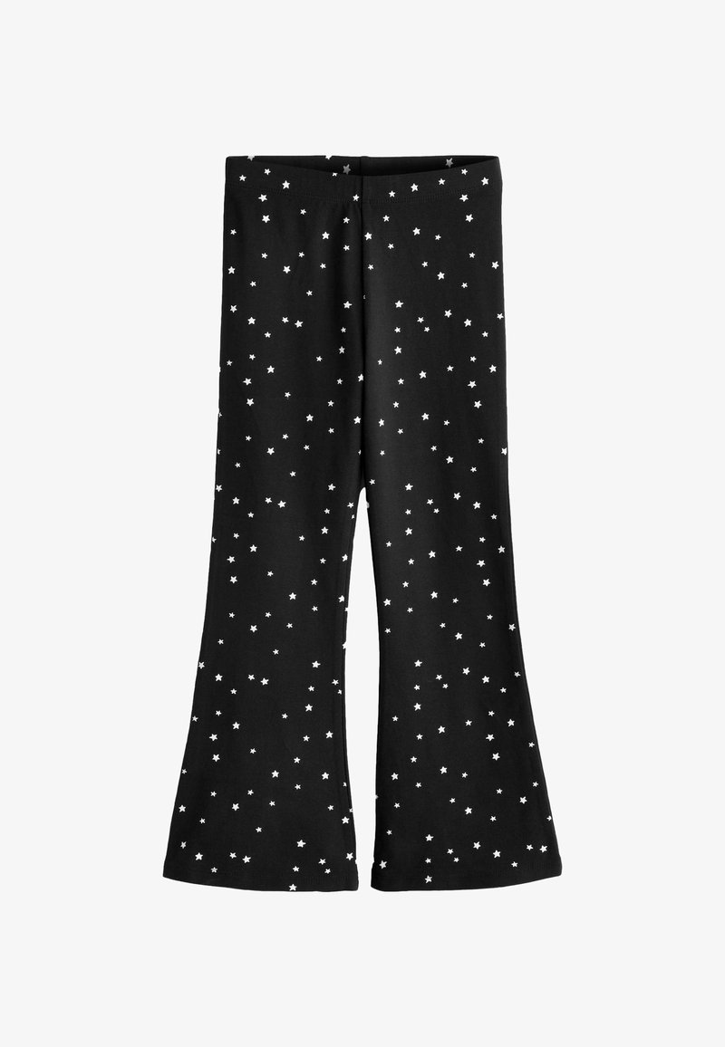 Černé zvonové kalhoty se vzorem opakujících se bílých hvězd. Vyrobené z měkké a elastické látky s elastickým pasem pro pohodlí.