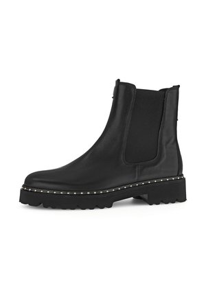 Black leather ankle boots with elastic side panels, round toe, and a chunky platform sole adorned with small metallic studs.
