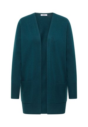 Cardigan lavorato a maglia color teal con apertura frontale, due tasche anteriori, maniche lunghe e vestibilità rilassata. Tessuto morbido e di peso medio.