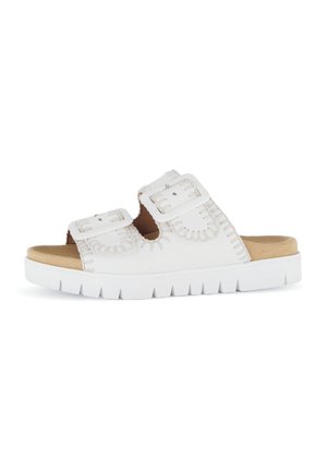 White synthetic slide sandal with two adjustable straps, contrasting stitching, and a cushioned insole on a textured rubber outsole.
