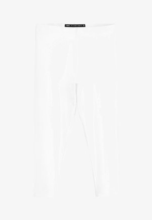 Leggings bianchi realizzati in un materiale elastico e morbido. Design di lunghezza media con una texture liscia e senza pattern o componenti visibili.