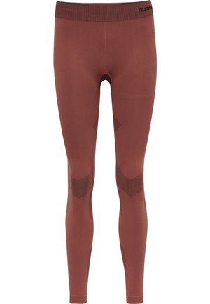 Leggings de sport rouges avec une taille texturée et côtelée, et des accents noirs en diagonale. Fabriqués en tissu extensible et évacuant l'humidité pour le confort.