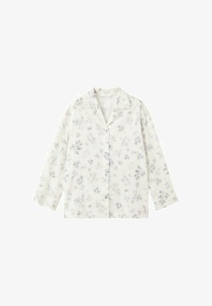 Camicia bianca a maniche lunghe con bottoni, con un delicato motivo floreale grigio e un colletto classico, distesa su uno sfondo bianco.