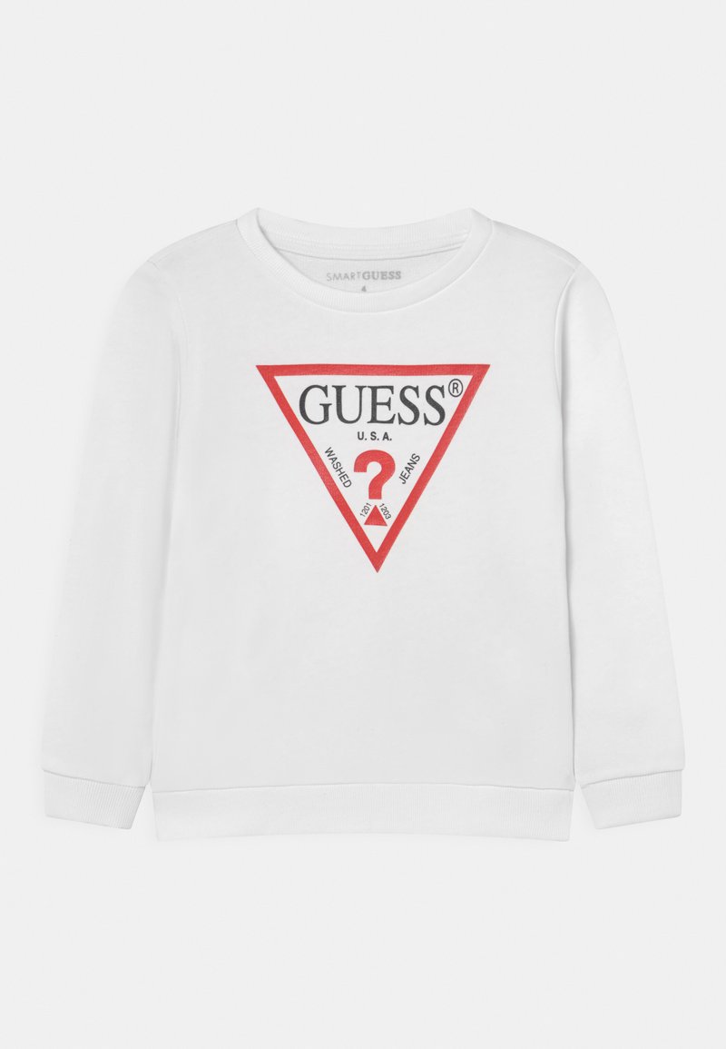 Hvit sweatshirt med et trekantet rødt emblem med teksten "GUESS U.S.A." og "WASHED JEANS". Ribbestrikkede mansjetter og krage. Mykt stoff.